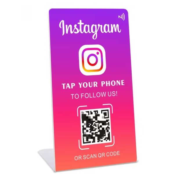 Instagram NFC follow stand on a shop counter, tap your phone to follow us with QR code backup