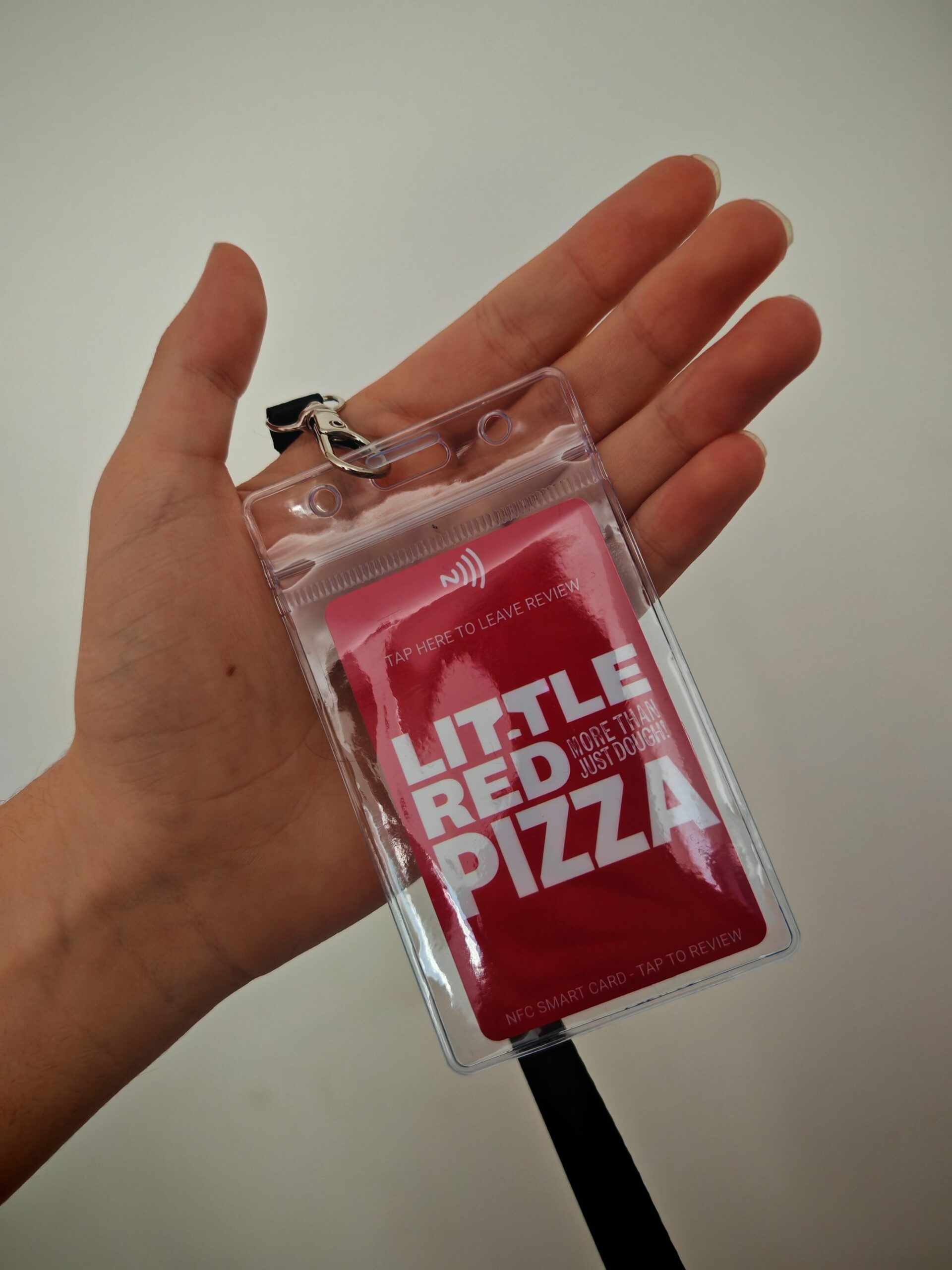 Little Red Pizza branded NFC lanyard review card